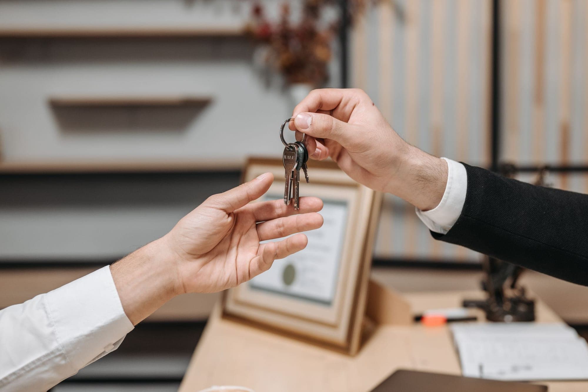 An agent handing over the keys